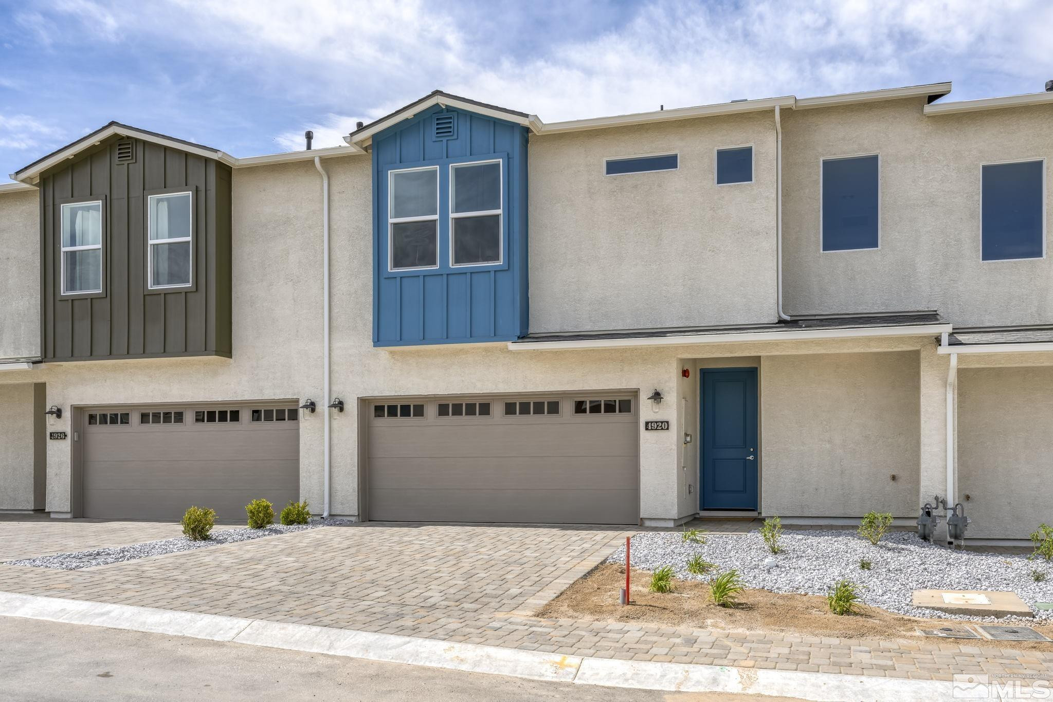 4920 Little Rock Way Sun Valley, NV 89433 - Photo 37 of 37 a front view of a house with a yard