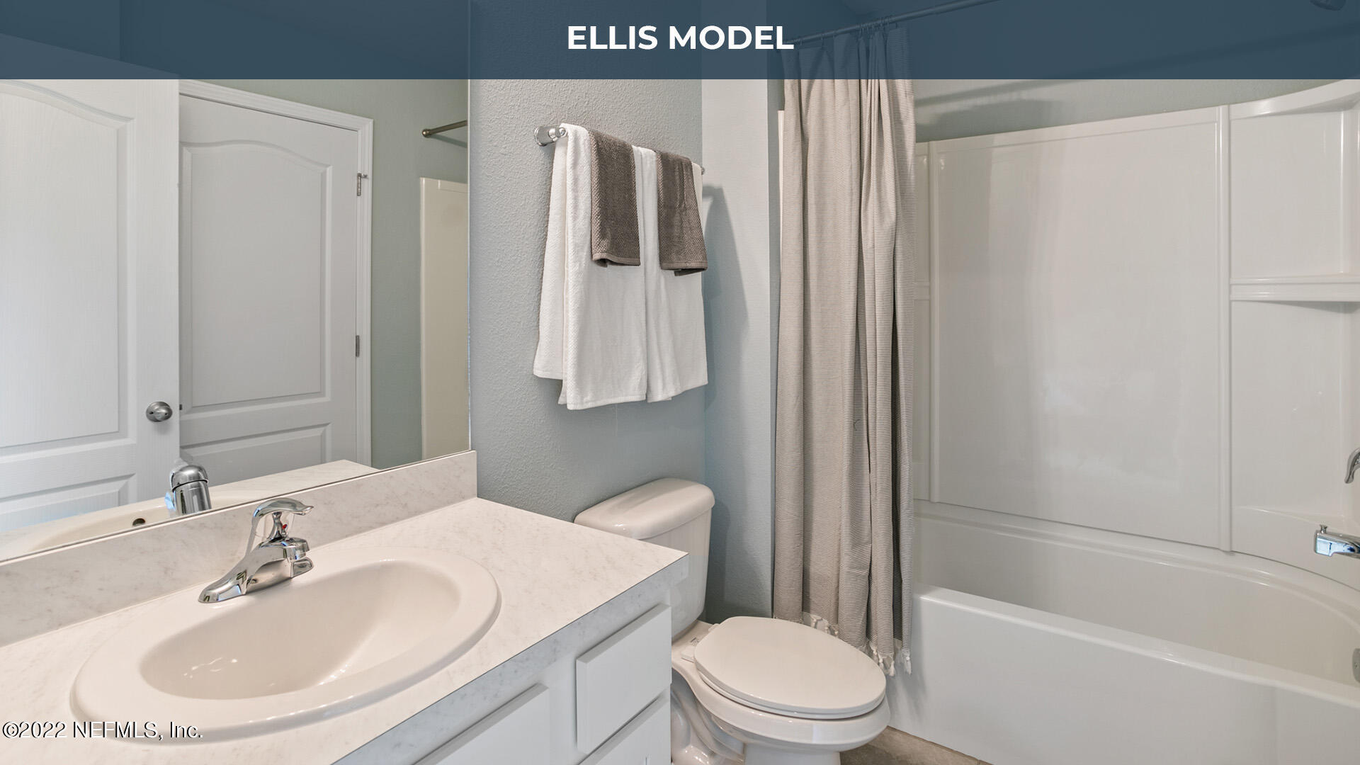 8368 Retrograde Road Jacksonville, FL 32256 - Photo 12 of 25 a bathroom with a sink toilet and shower