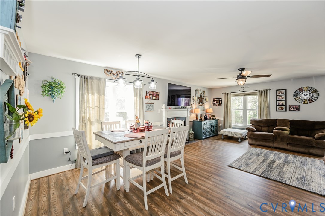 915 Manchester Road Bumpass, VA 23024 - Photo 14 of 49 a living room with furniture and a flat screen tv
