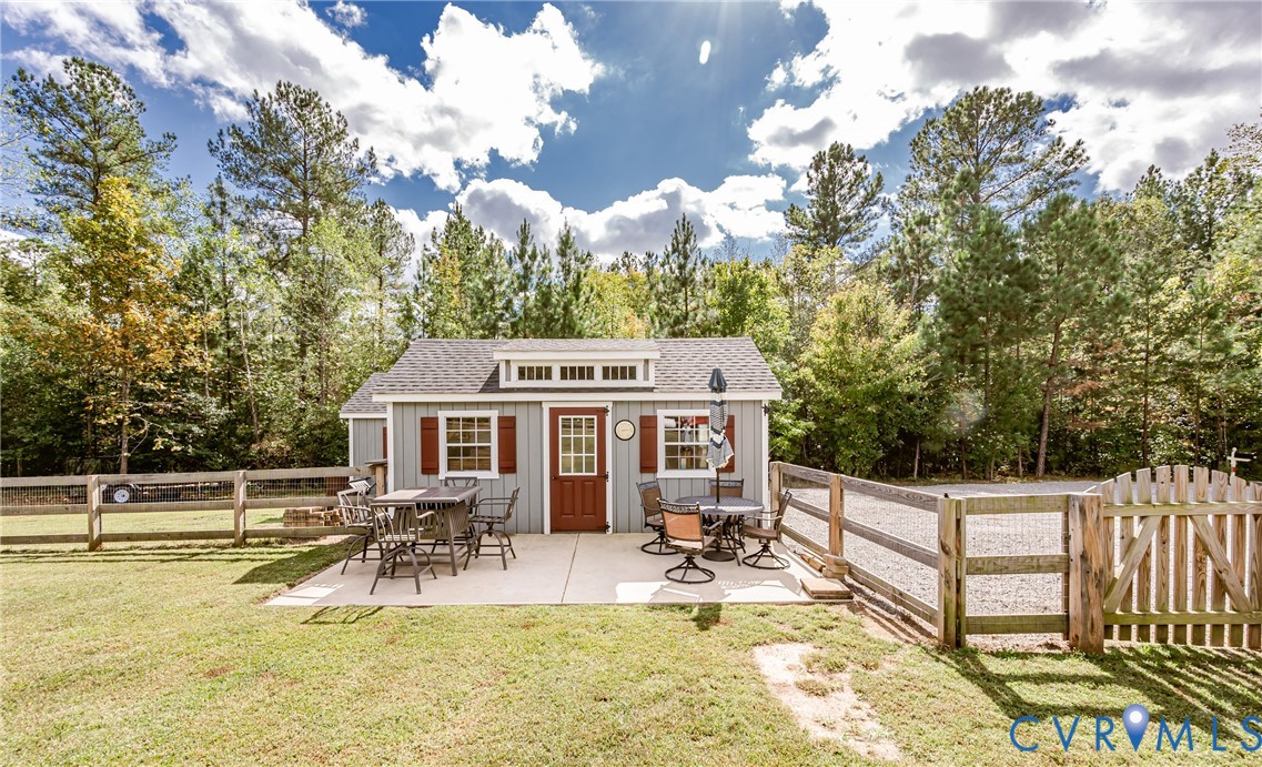 915 Manchester Road Bumpass, VA 23024 - Photo 41 of 49 a view of a house with backyard and sitting area