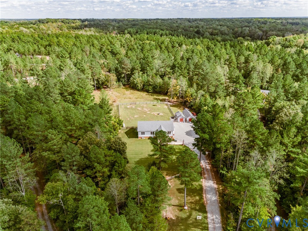915 Manchester Road Bumpass, VA 23024 - Photo 44 of 49 a view of a yard with an outdoor space and a lake view