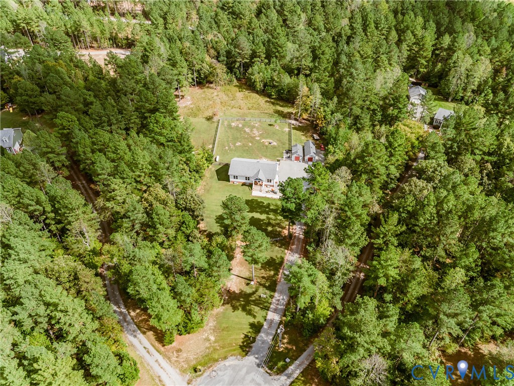 915 Manchester Road Bumpass, VA 23024 - Photo 46 of 49 an aerial view of a house with a yard