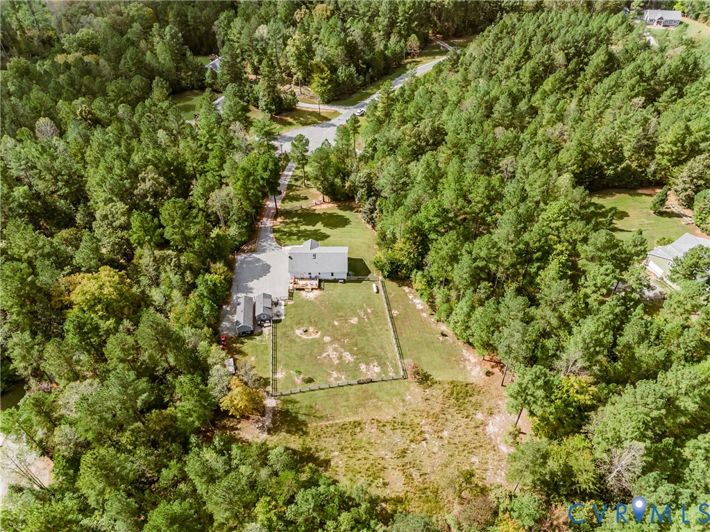 915 Manchester Road Bumpass, VA 23024 - Photo 48 of 49 a aerial view of a house with a yard