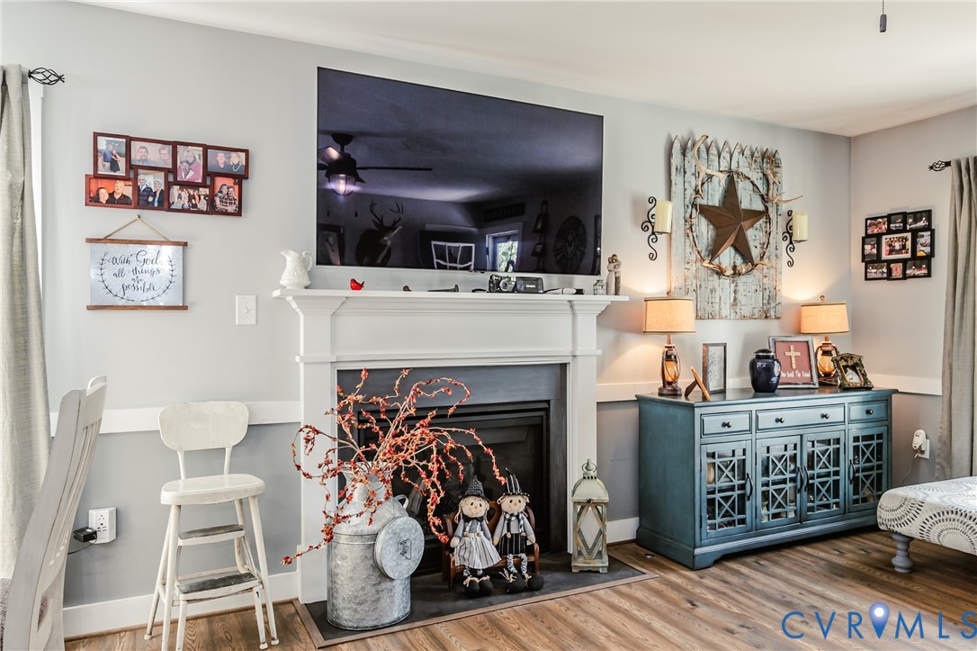 915 Manchester Road Bumpass, VA 23024 - Photo 7 of 49 a view of a livingroom with furniture and a fireplace
