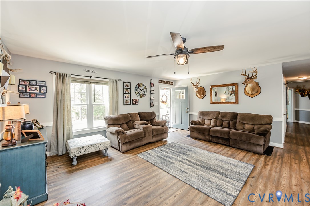915 Manchester Road Bumpass, VA 23024 - Photo 8 of 49 a living room with furniture and a window