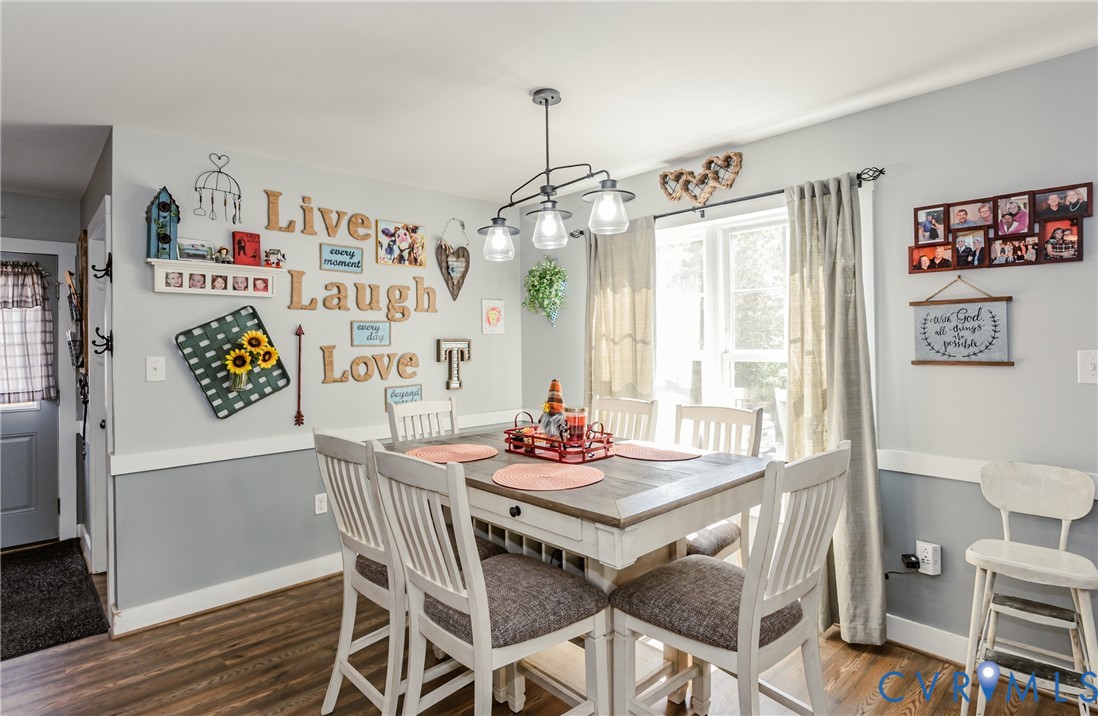 915 Manchester Road Bumpass, VA 23024 - Photo 10 of 49 a dining room with furniture and window