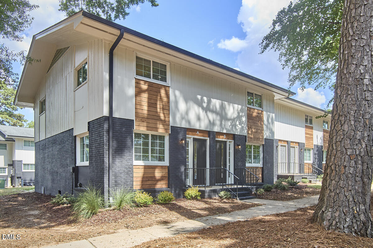 2613 McNeil Street, Unit F Raleigh, NC 27608 - Photo 2 of 30 a front view of a building with street view