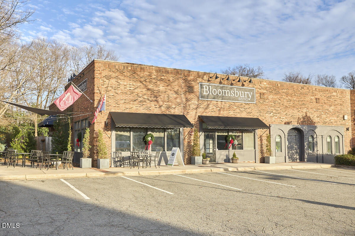 2613 McNeil Street, Unit F Raleigh, NC 27608 - Photo 26 of 30 a view of a building with a street