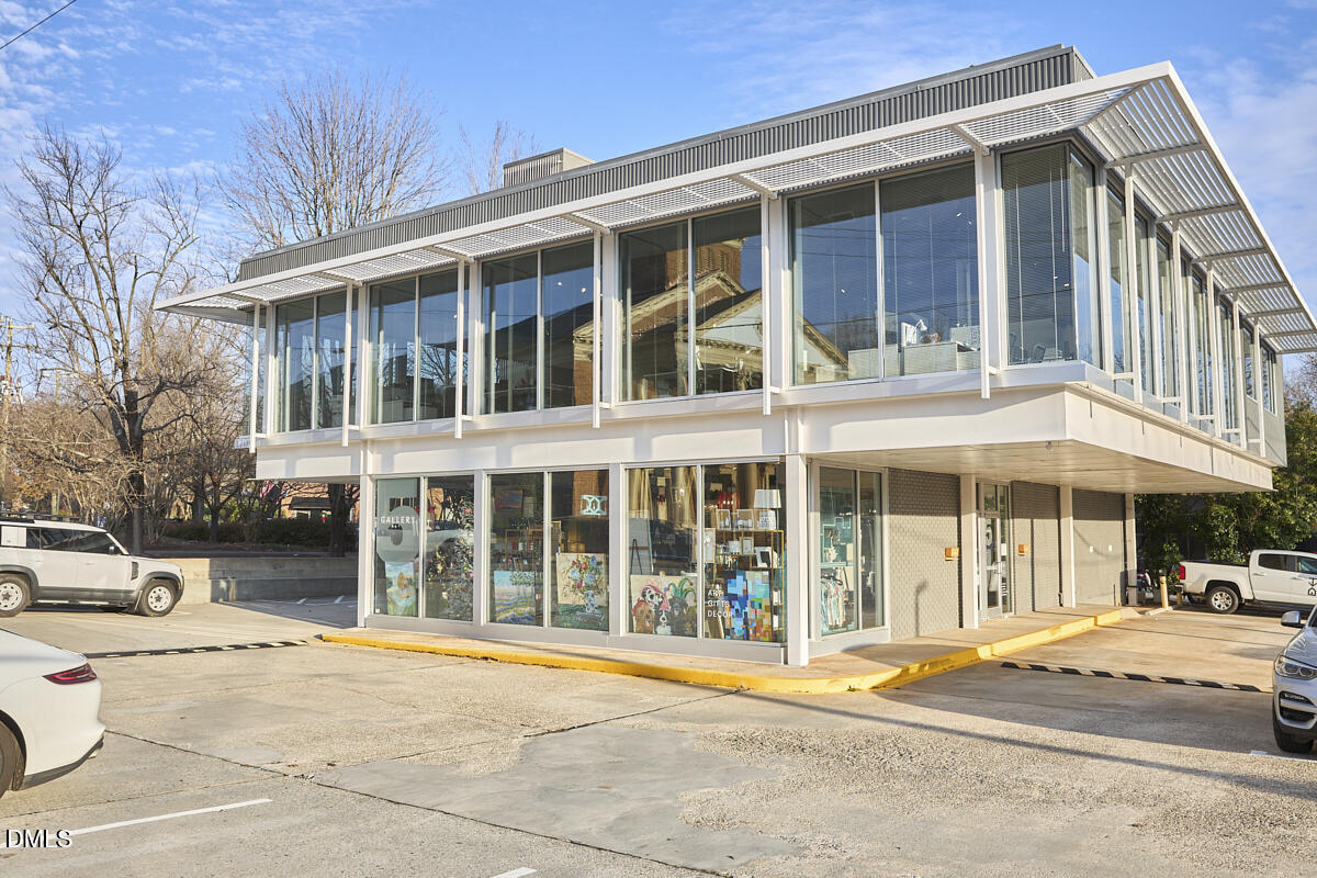 2613 McNeil Street, Unit F Raleigh, NC 27608 - Photo 29 of 30 a view of a building with a outdoor space