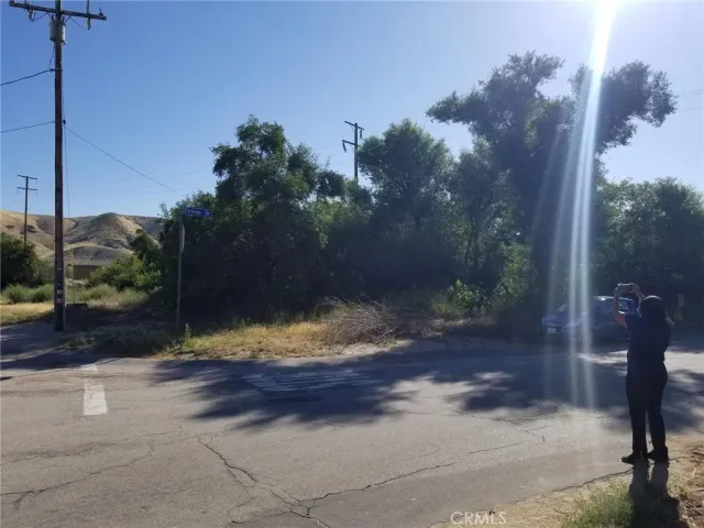 a view of a backyard of a house