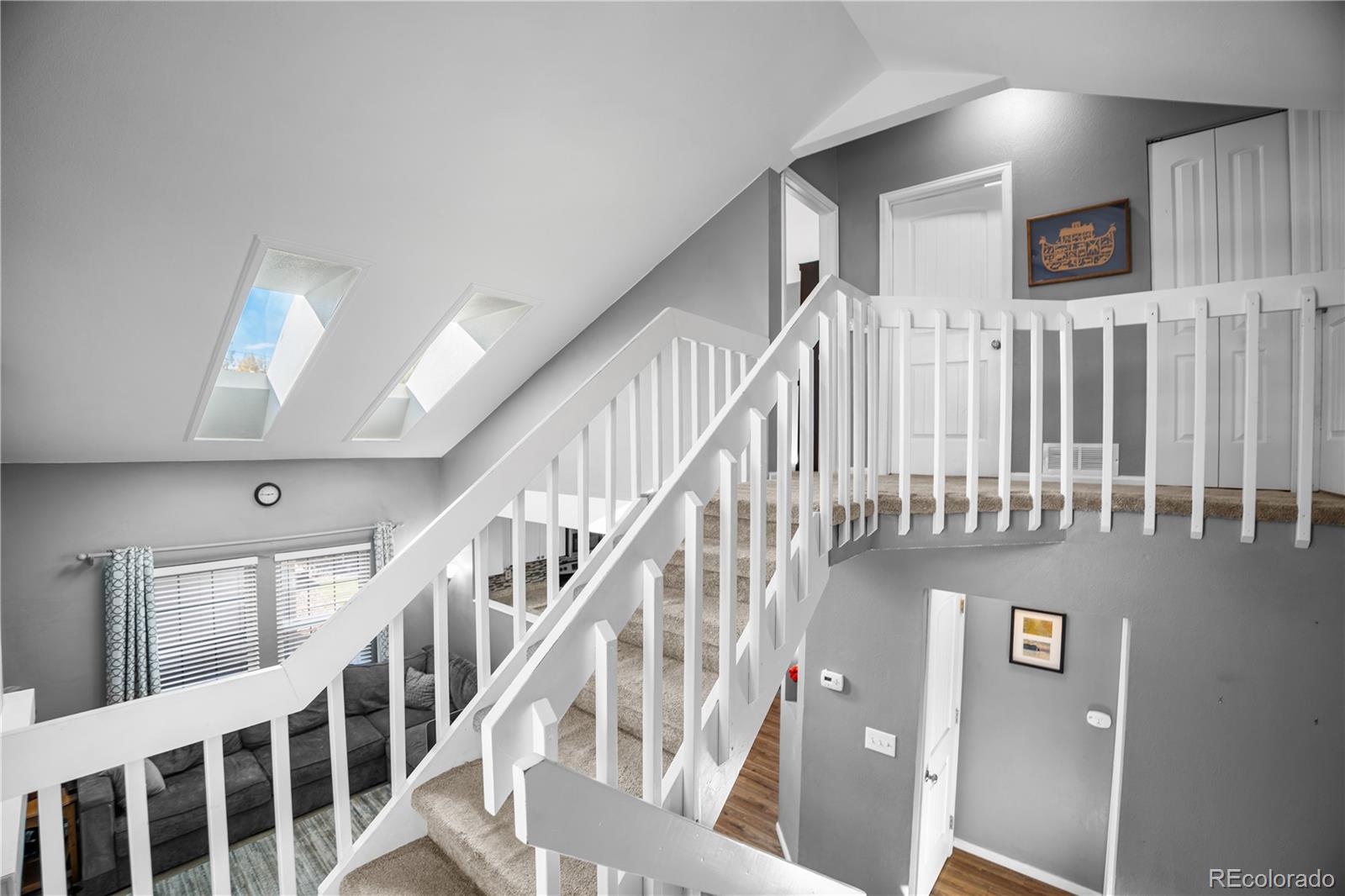 8567 Rabbitbrush Way Parker, CO 80134 - Photo 25 of 46 a view of entryway and hall with a front door