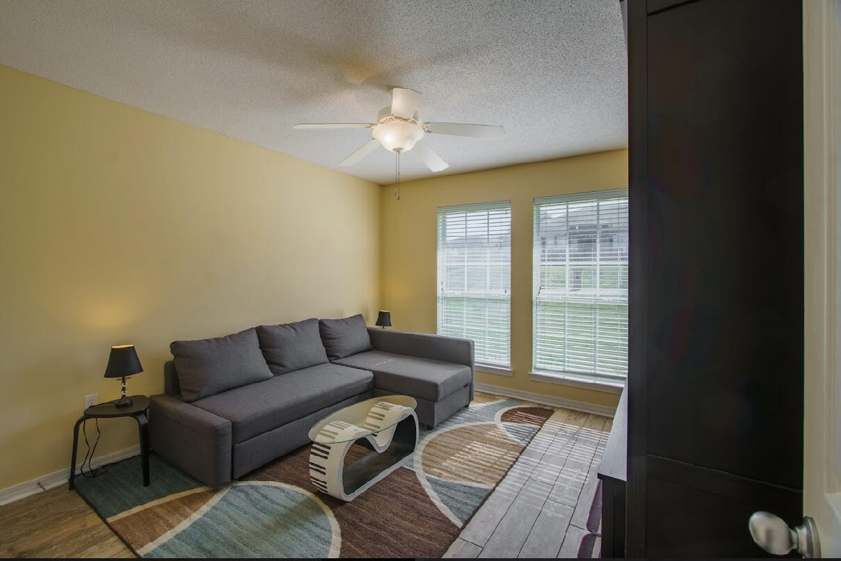 232 Raptor Drive Crestview, FL 32536 - Photo 42 of 42 a living room with furniture and a large window