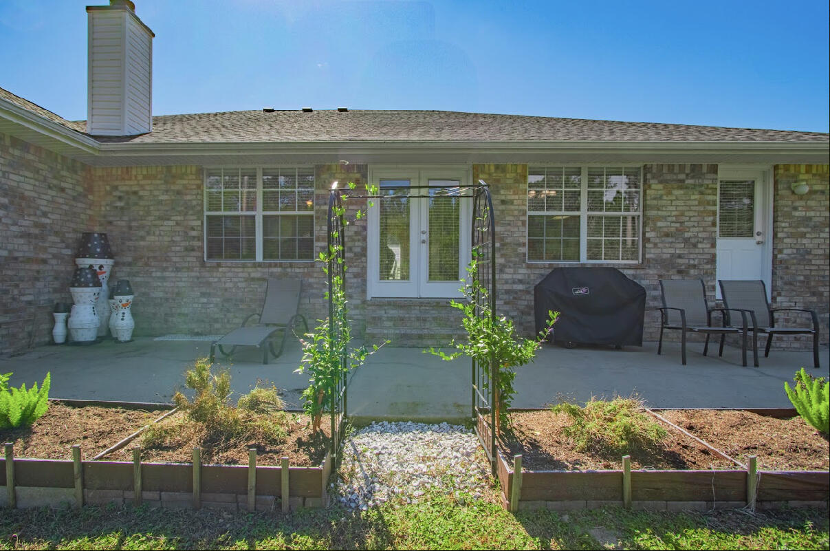232 Raptor Drive Crestview, FL 32536 - Photo 10 of 42 a front view of a house with garden