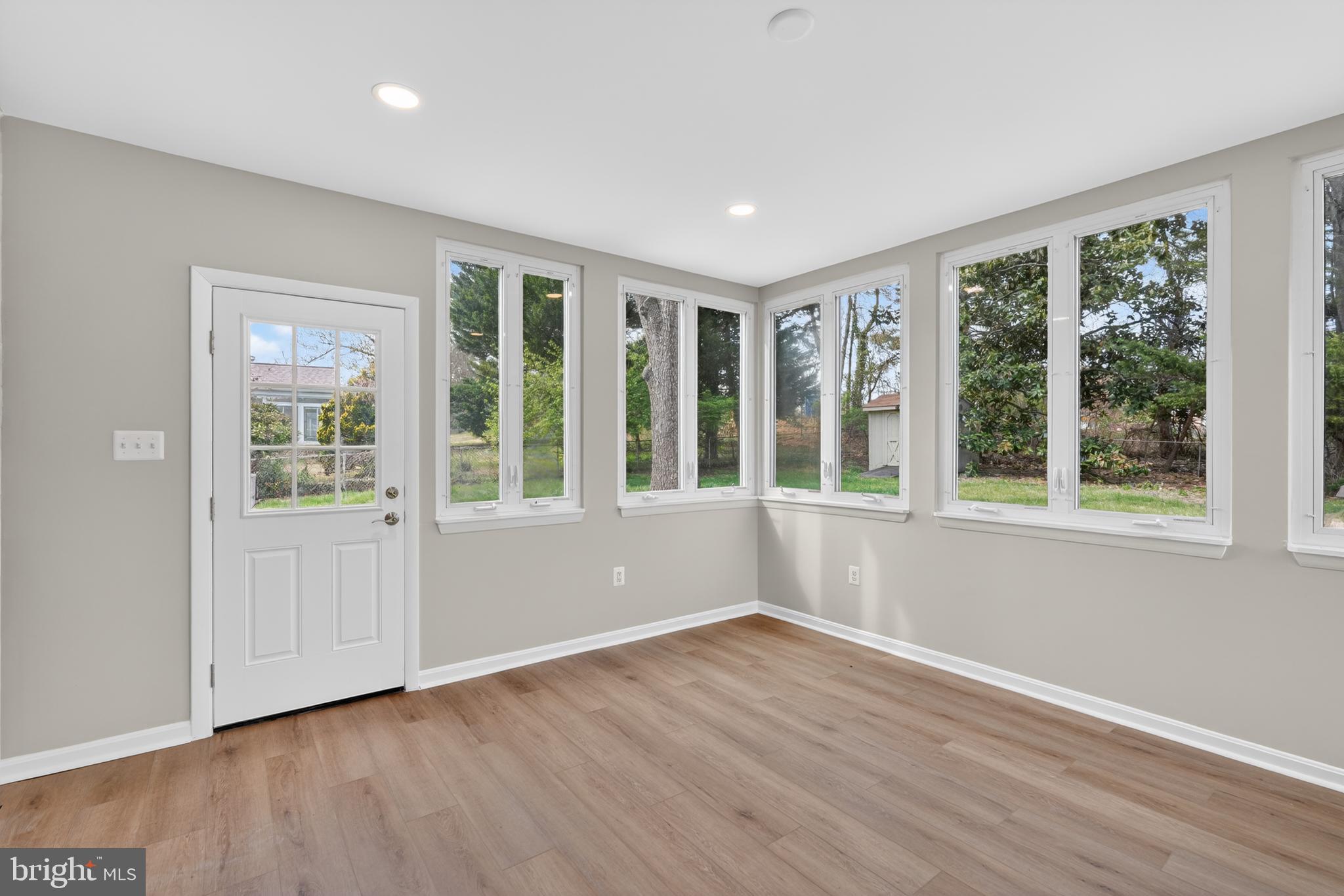 4625 Strathblane Place Alexandria, VA 22304 - Photo 18 of 22 a view of empty room with wooden floor and fan