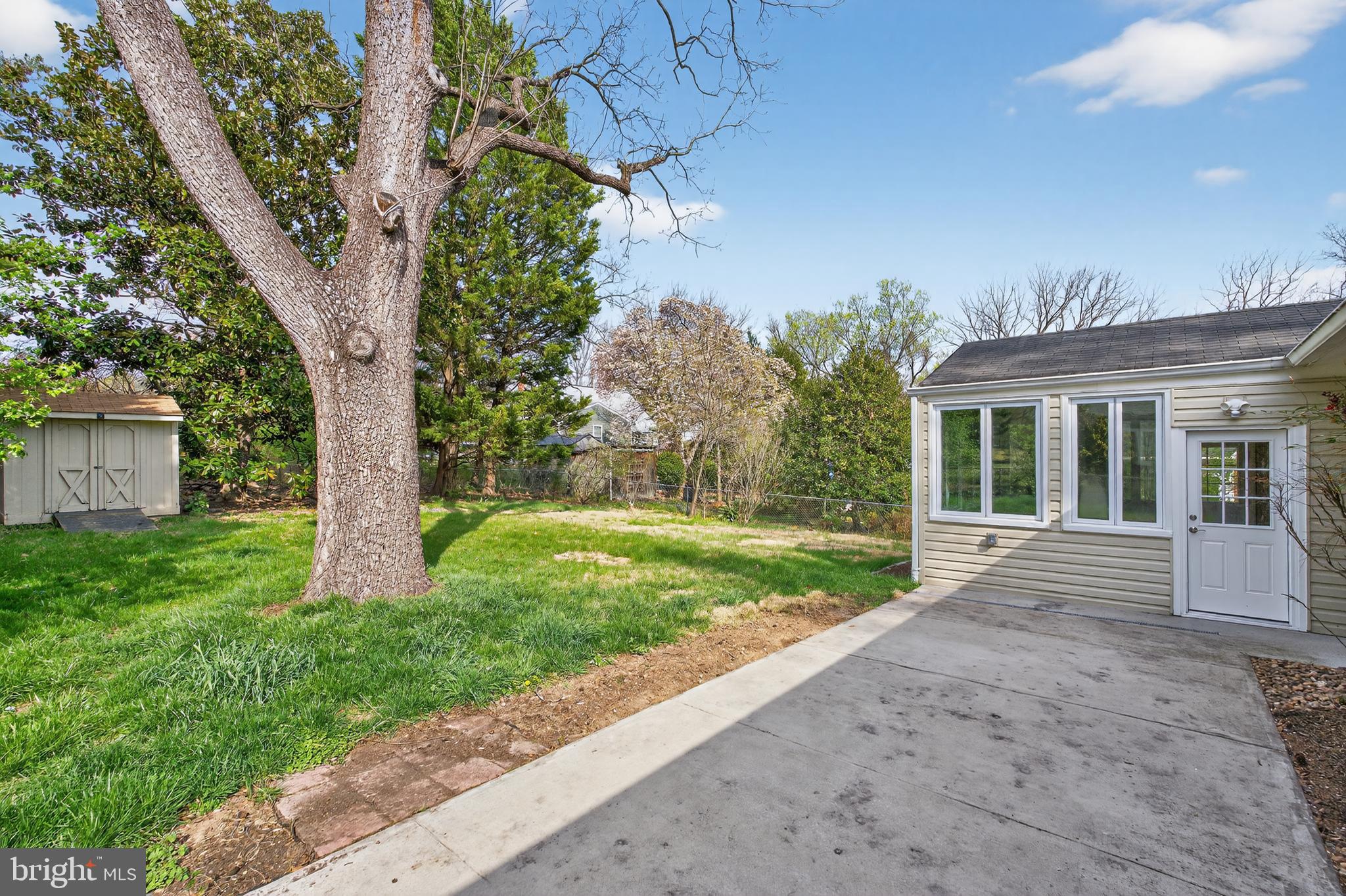 4625 Strathblane Place Alexandria, VA 22304 - Photo 19 of 22 a front view of a house with garden