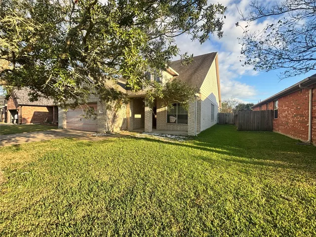 a house view with a outdoor space