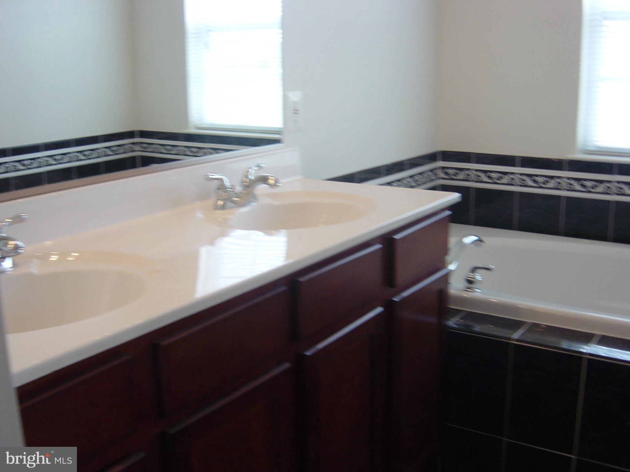 804 Lowe Road Middle River, MD 21220 - Photo 14 of 27 Double sinks and separate tub in Master Bath
