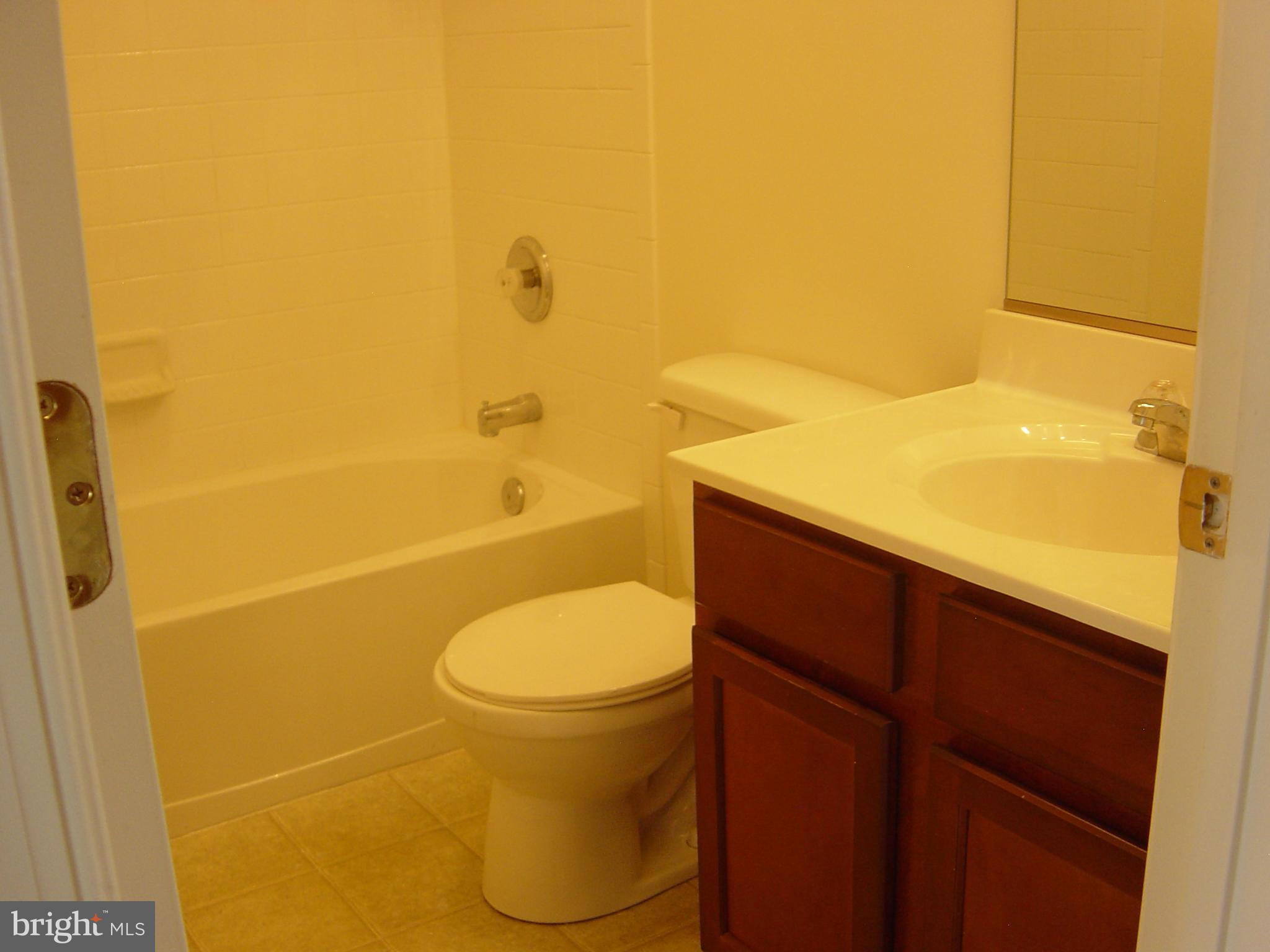 804 Lowe Road Middle River, MD 21220 - Photo 16 of 27 Full bath on upper level in hallway