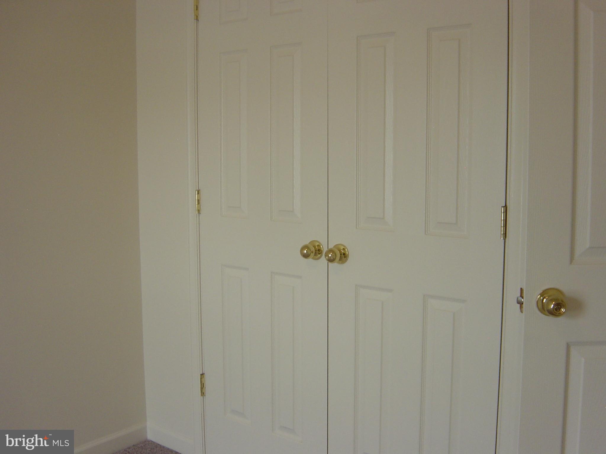 804 Lowe Road Middle River, MD 21220 - Photo 20 of 27 Double door closet in third bedroom