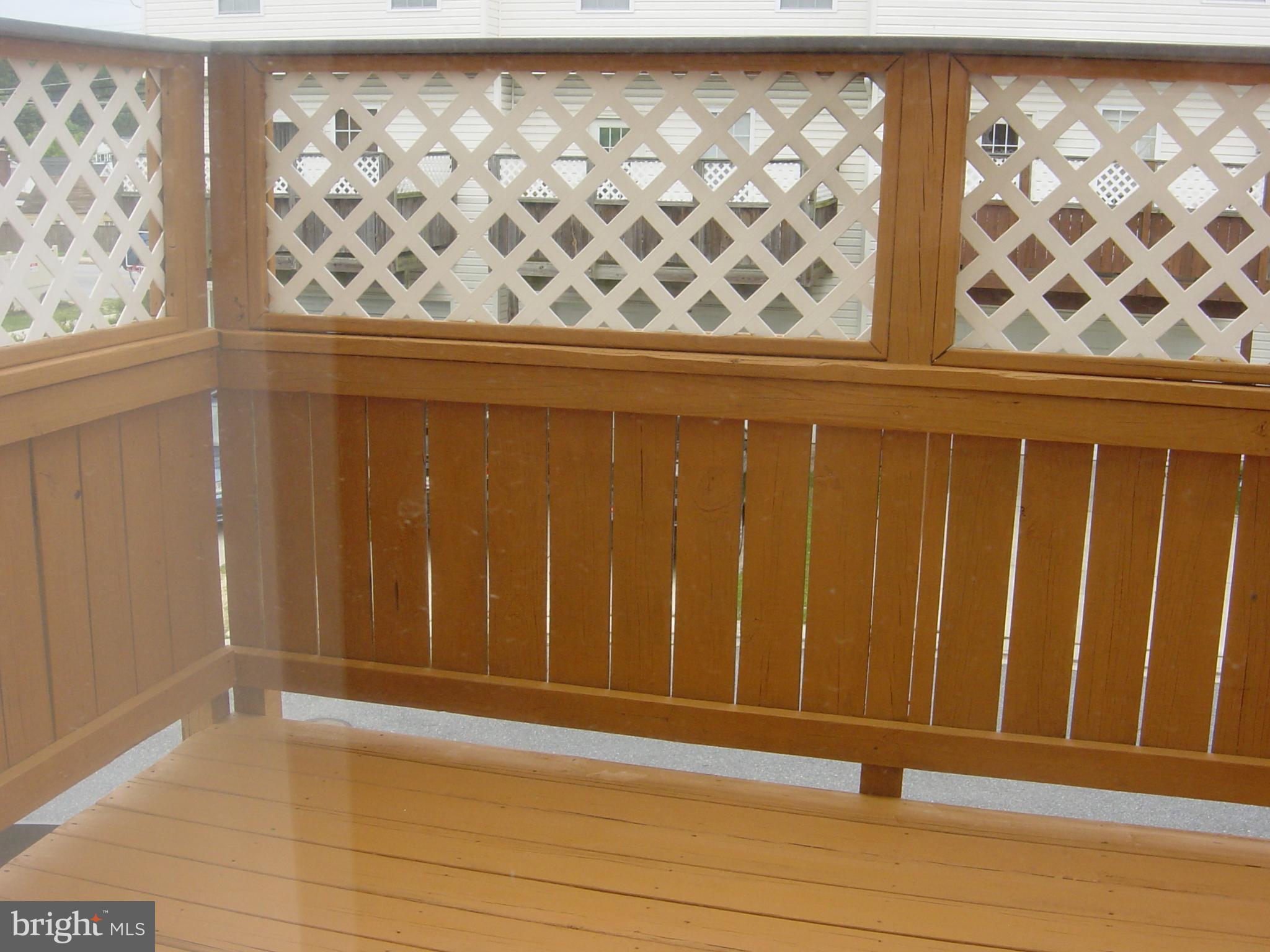 804 Lowe Road Middle River, MD 21220 - Photo 10 of 27 Freshly stained deck off of kitchen slider