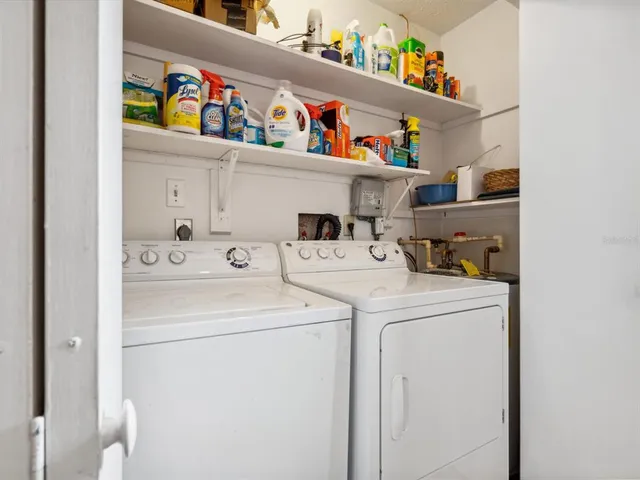a utility room with dryer and washer