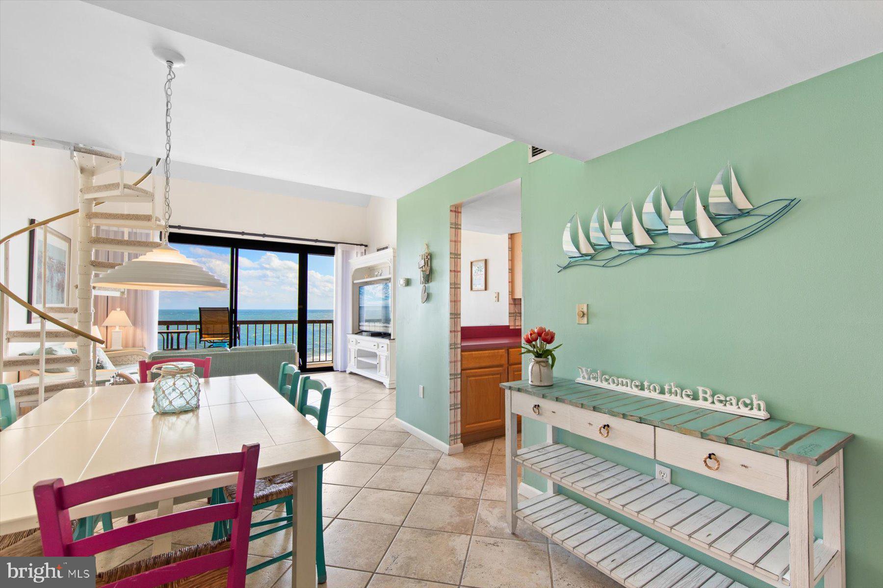 907 Georgetown House, Unit PH07 Bethany Beach, DE 19930 - Photo 21 of 48 a reading room with furniture and rug floor