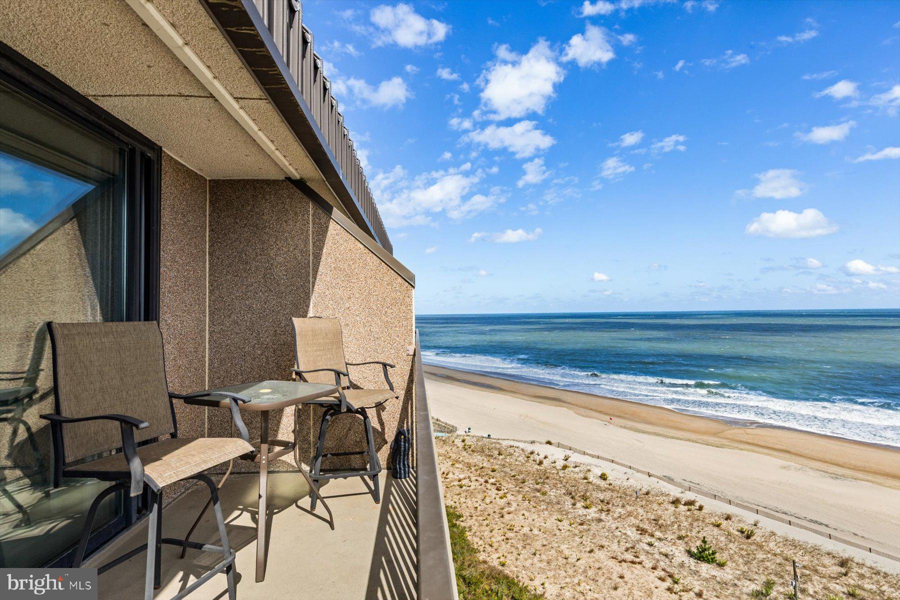 907 Georgetown House, Unit PH07 Bethany Beach, DE 19930 - Photo 8 of 48 a view of swimming pool with outdoor seating