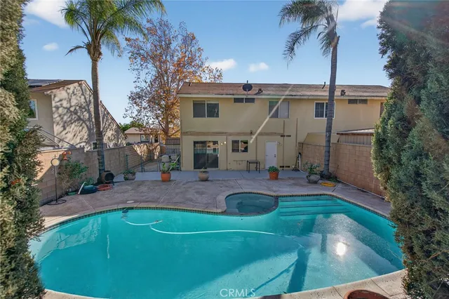 a view of a house with swimming pool