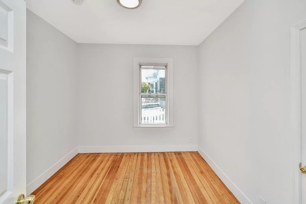 41 Dix Street, Unit 2 Boston, MA 02122 - Photo 11 of 19 a view of empty room with window