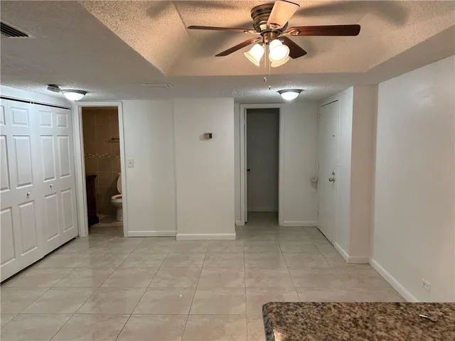 a view of a room with a large window