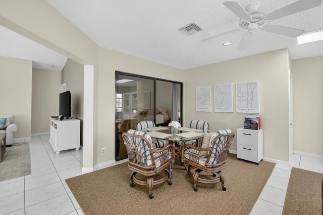 a view of a dining room with furniture