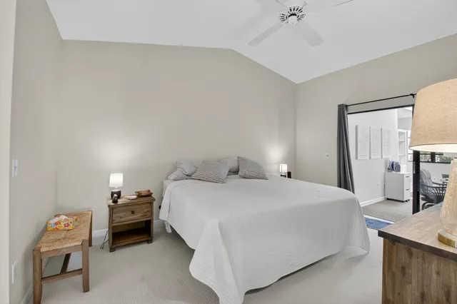 a bedroom with a bed and a view of bathroom