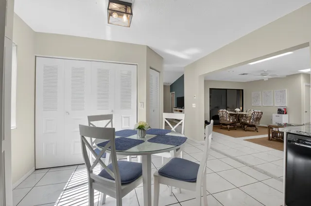 a view of a livingroom with furniture and a window