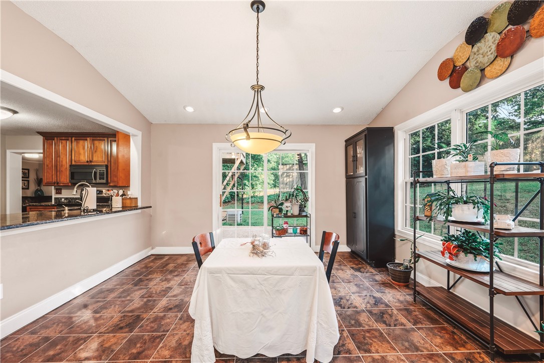 2001 Ridgeview Lane Seneca, SC 29678 - Photo 11 of 27 A welcoming dining area with tiled floors and abundant natural light from large windows.