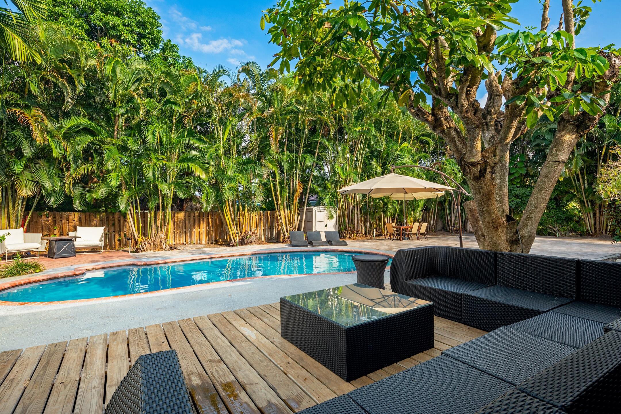 7306 Clarke Road Lake Clarke Shores, FL 33406 - Photo 11 of 36 a view of a roof deck with furniture