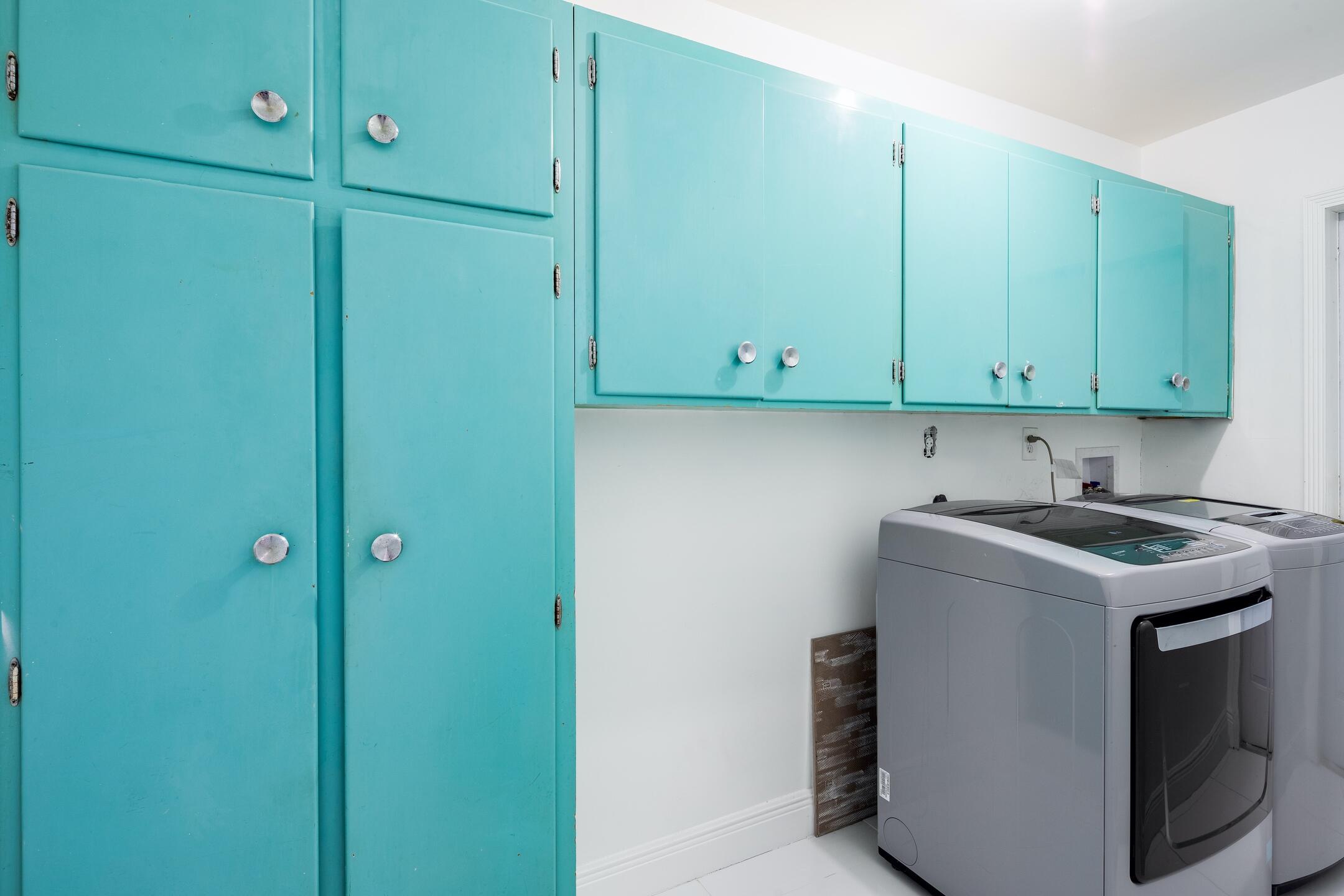 7306 Clarke Road Lake Clarke Shores, FL 33406 - Photo 18 of 36 a view of a kitchen with cabinets
