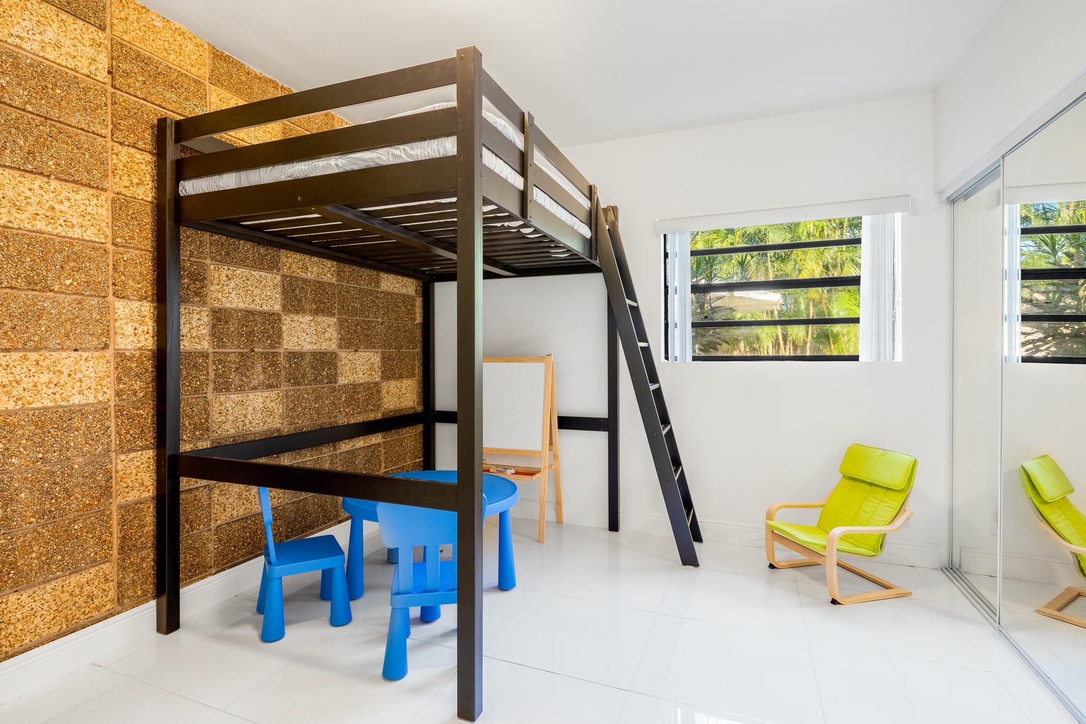 7306 Clarke Road Lake Clarke Shores, FL 33406 - Photo 21 of 36 a view of a bedroom with gym equipment