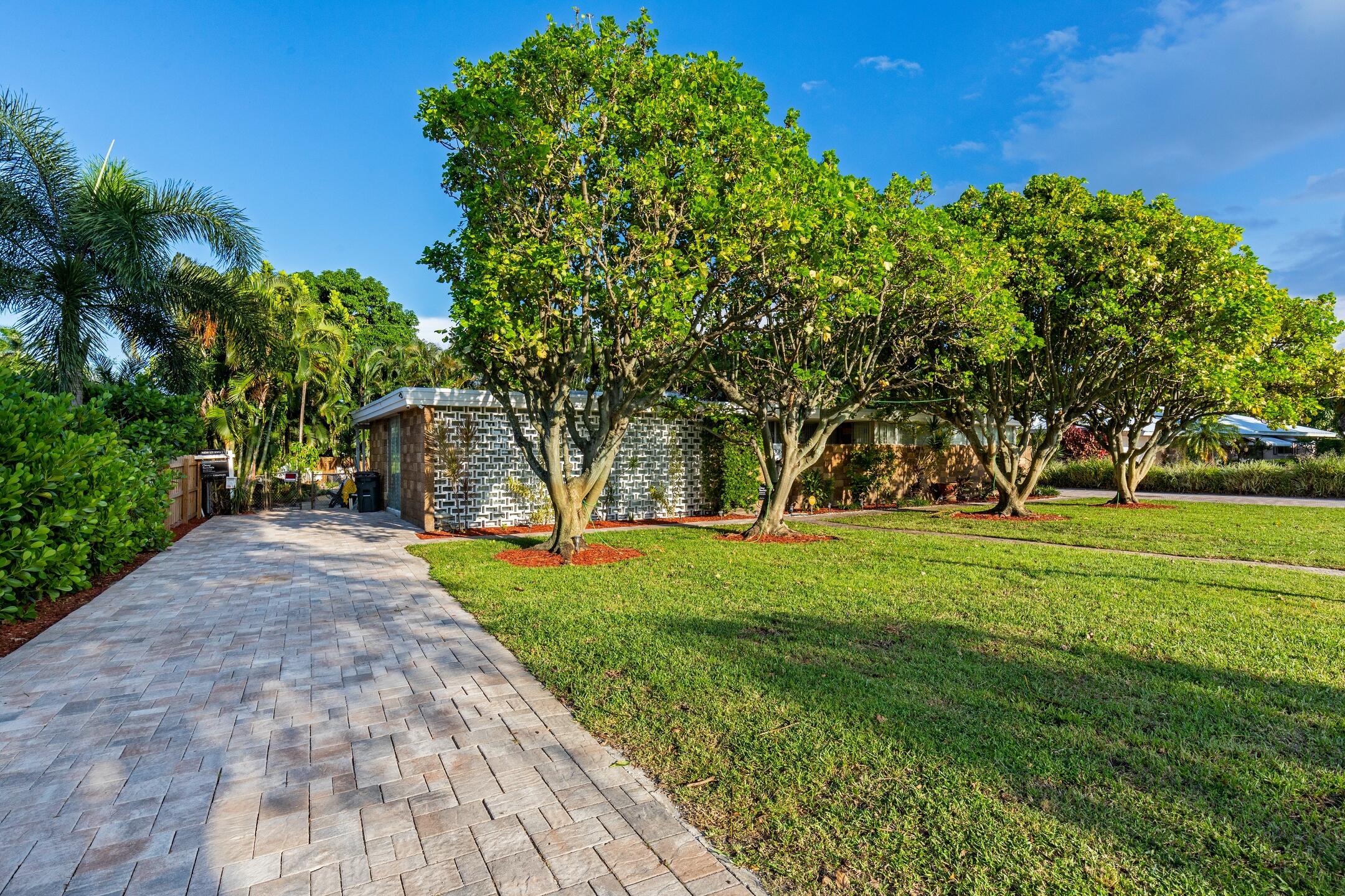 7306 Clarke Road Lake Clarke Shores, FL 33406 - Photo 26 of 36 a view of a park with palm trees