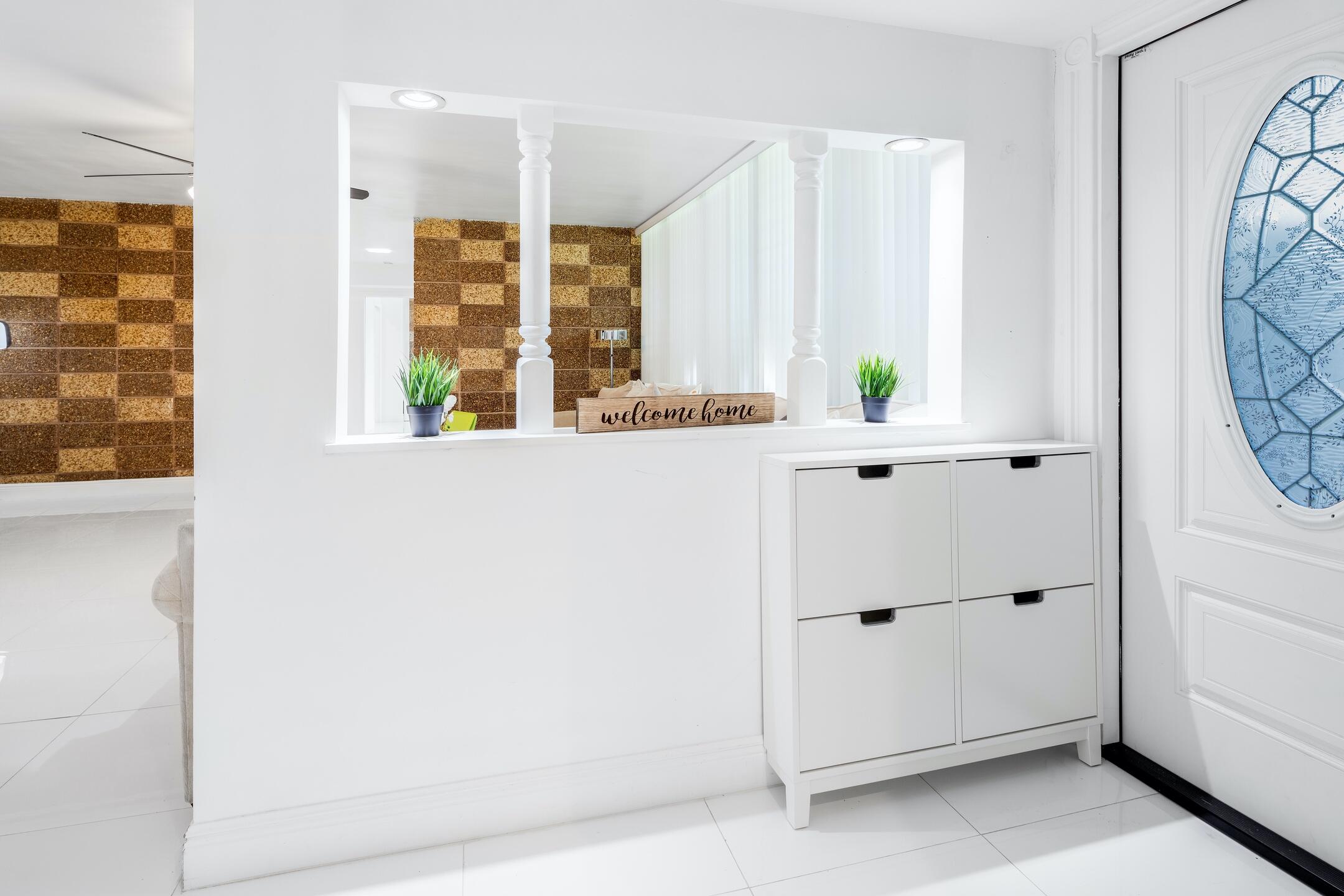 7306 Clarke Road Lake Clarke Shores, FL 33406 - Photo 29 of 36 a view of an entryway with window