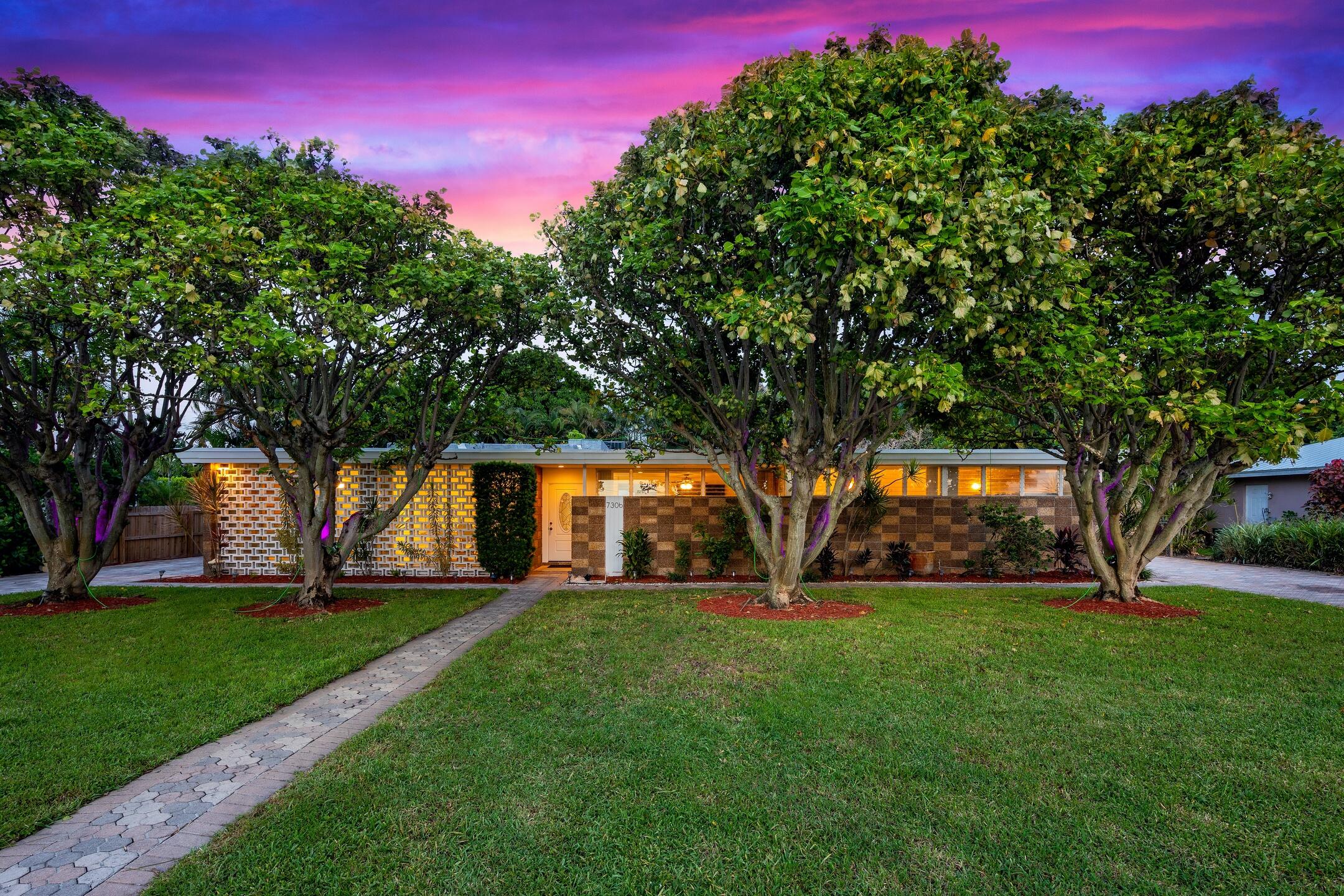 7306 Clarke Road Lake Clarke Shores, FL 33406 - Photo 34 of 36 a view of yard with tree s