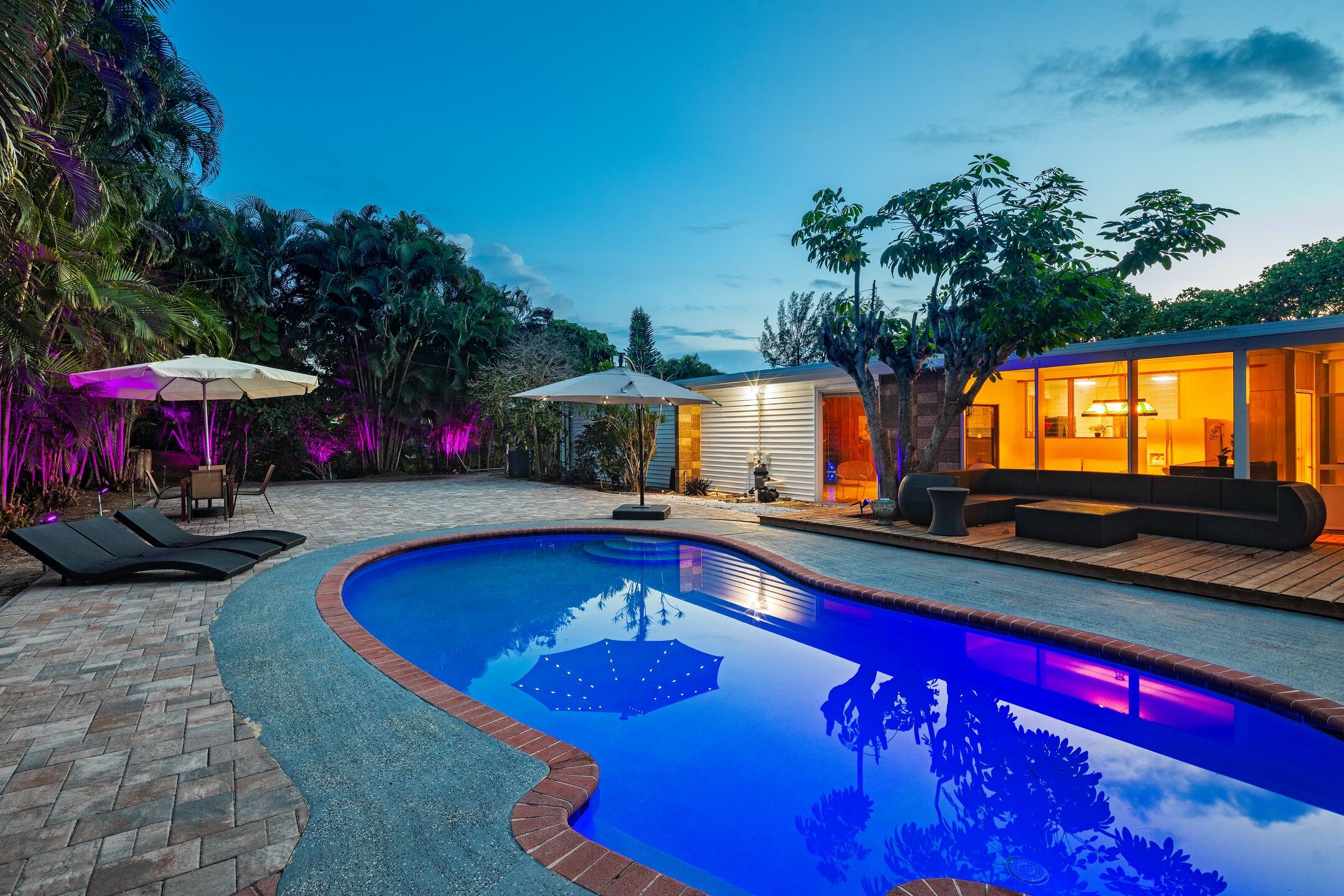 7306 Clarke Road Lake Clarke Shores, FL 33406 - Photo 36 of 36 a view of swimming pool with seating space