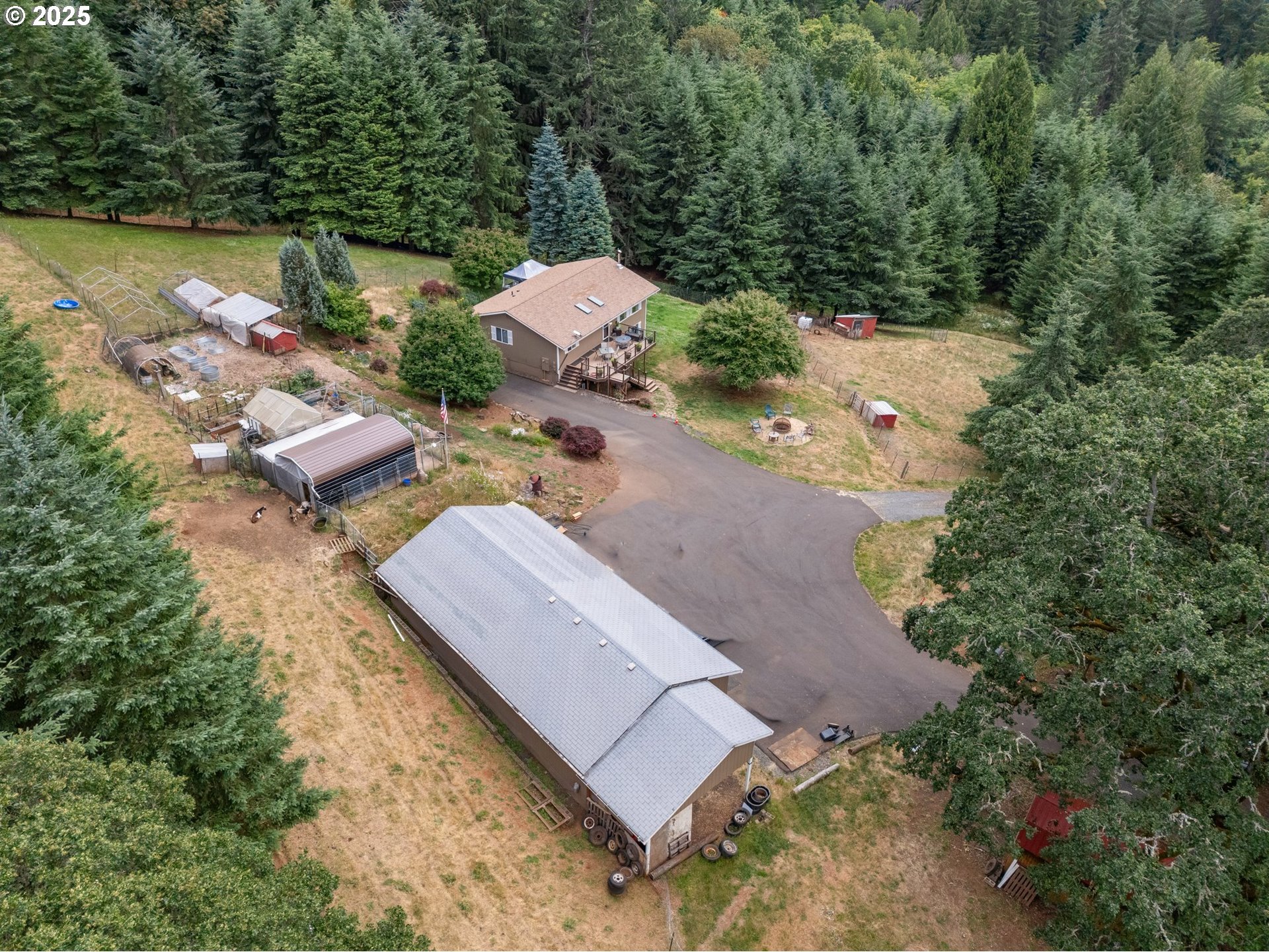19791 Northeast Sunnycrest Road Newberg, OR 97132 - Photo 29 of 40 an aerial view of a house with a yard