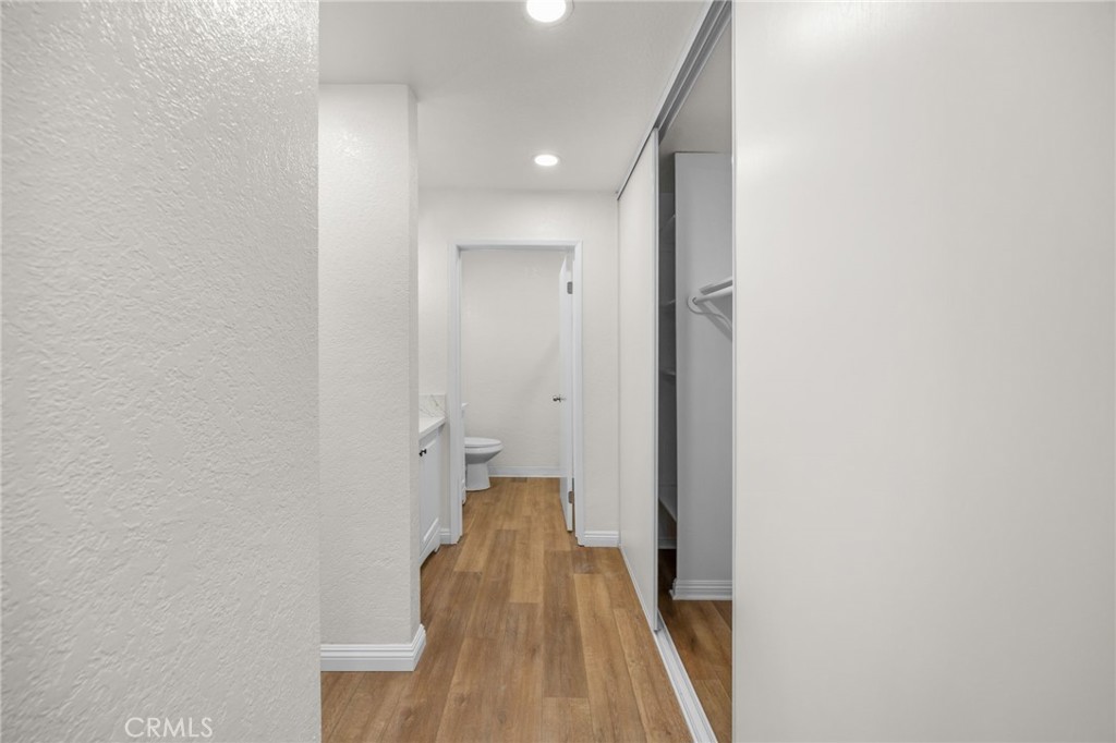 600 West 3rd Street, Unit B205 Santa Ana, CA 92701 - Photo 17 of 34 a view of a room with wooden floor