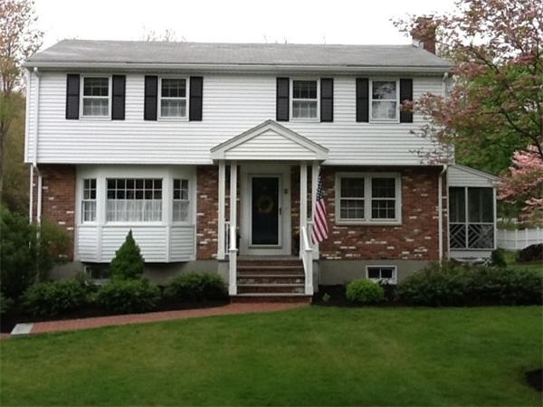 5 Ward Road Sudbury, MA 01776 - Photo 2 of 25 a front view of a house with a garden