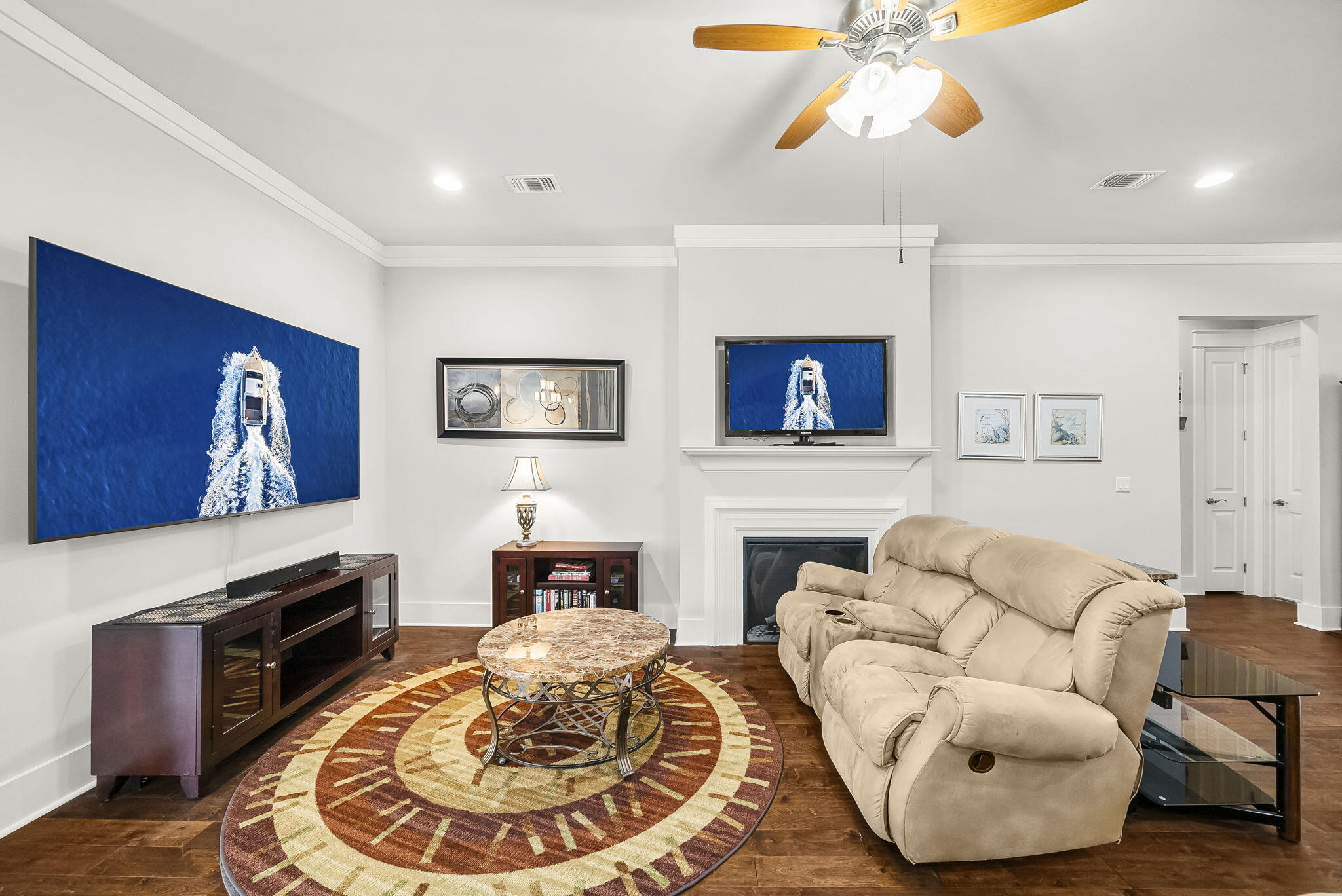 209 Blakely Drew Boulevard Santa Rosa Beach, FL 32459 - Photo 13 of 45 a living room with furniture and a fireplace