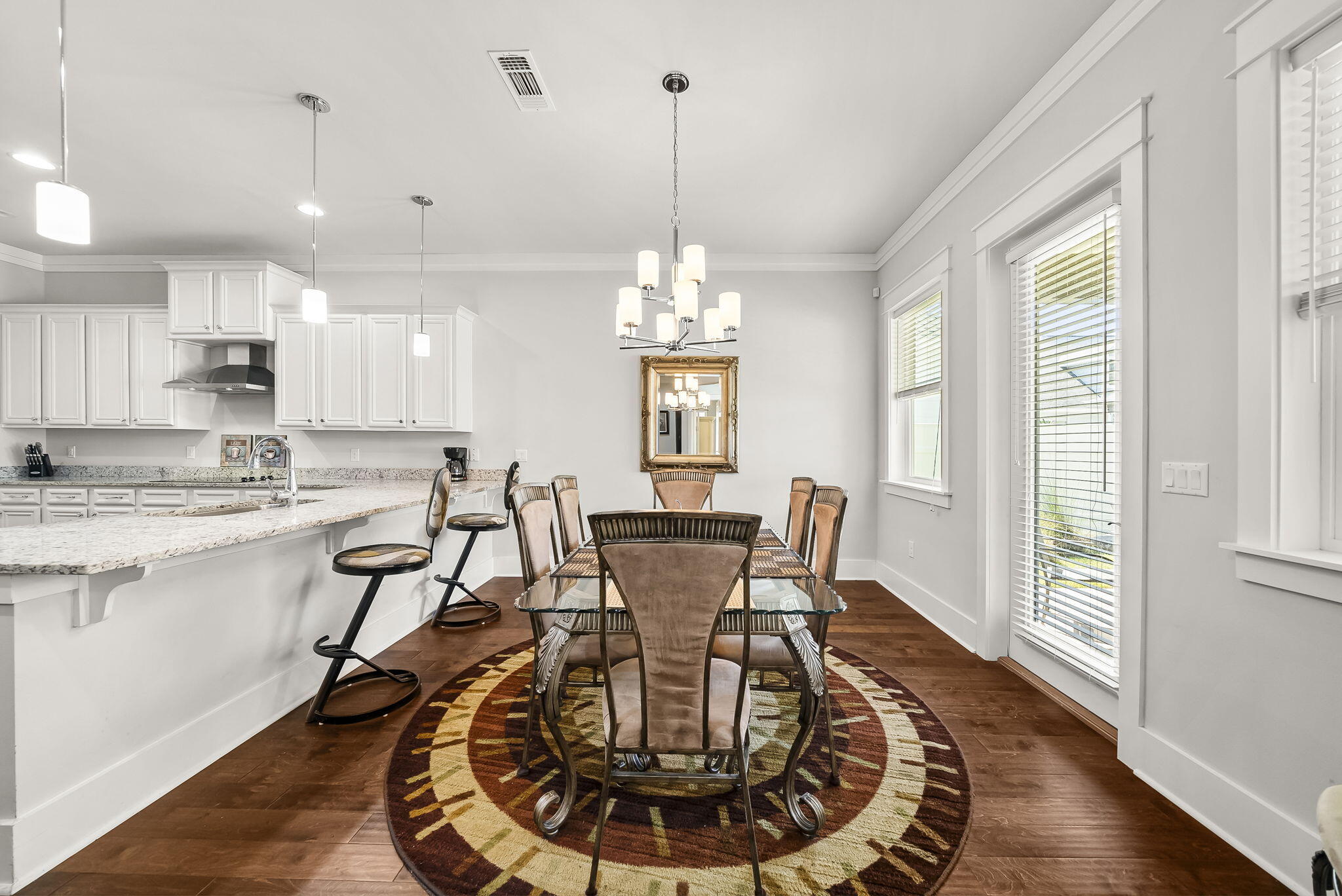 209 Blakely Drew Boulevard Santa Rosa Beach, FL 32459 - Photo 15 of 45 a view of a dining room with furniture window and wooden floor
