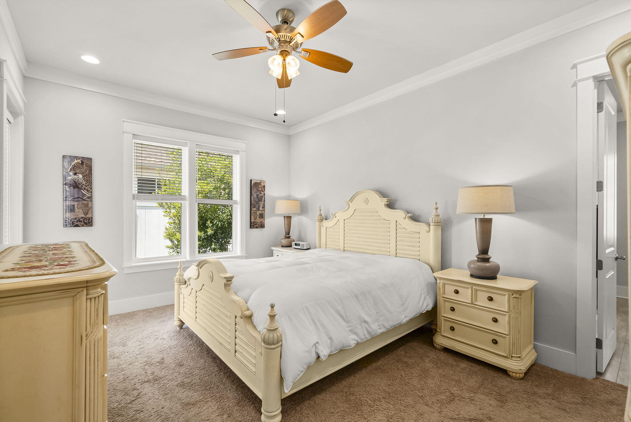 209 Blakely Drew Boulevard Santa Rosa Beach, FL 32459 - Photo 17 of 45 a bedroom with a bed and a chandelier