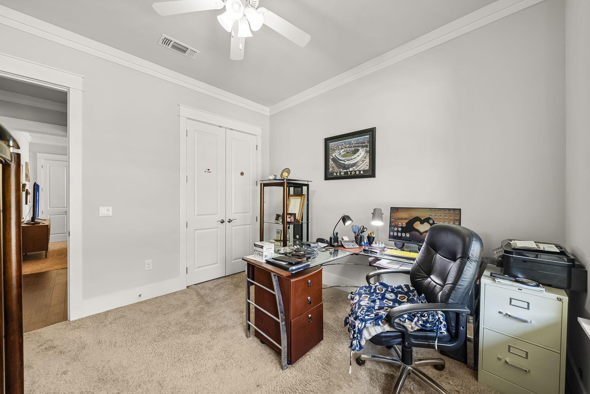 209 Blakely Drew Boulevard Santa Rosa Beach, FL 32459 - Photo 27 of 45 a living room with furniture and a flat screen tv