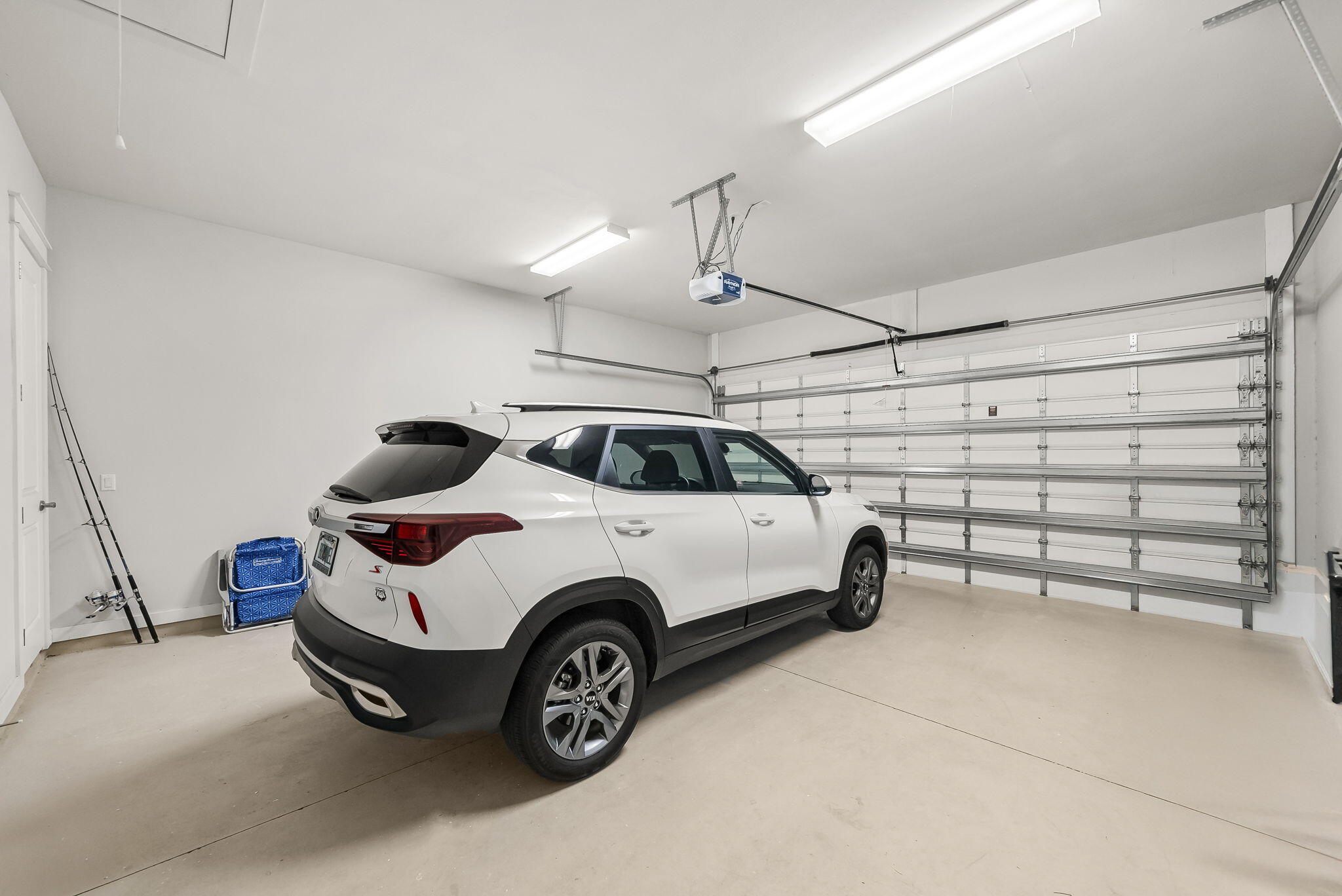 209 Blakely Drew Boulevard Santa Rosa Beach, FL 32459 - Photo 30 of 45 a view of a car in garage