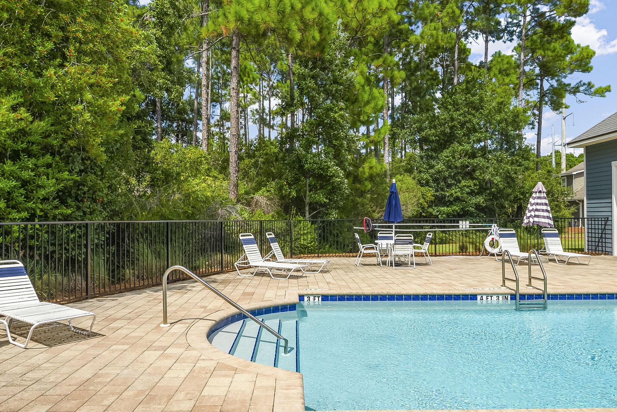209 Blakely Drew Boulevard Santa Rosa Beach, FL 32459 - Photo 44 of 45 a view of a lake with couches and wooden floor